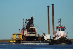 Tug Hercules towing crane barge on ICWW