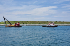 Tug Hercules towing A-frame barge in Stuart